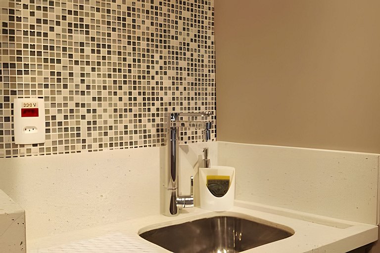 Apartamento pé na areia da praia do Tombo em Frente ao mar