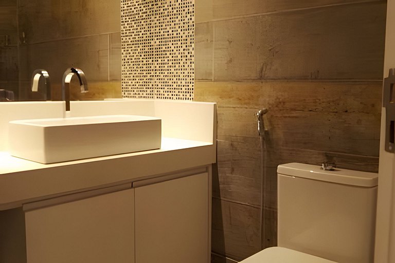 Apartamento pé na areia da praia do Tombo em Frente ao mar