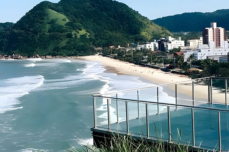 Apartamento pé na areia da praia do Tombo em Frente ao mar