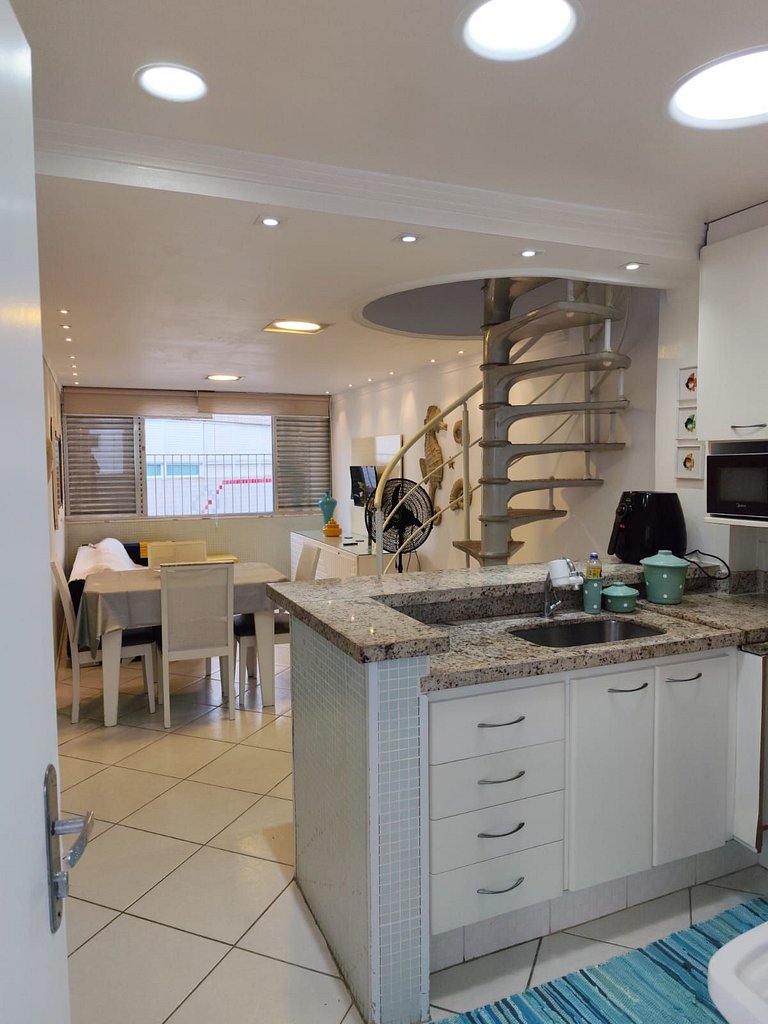 apartamento pé na areia da praia do tombo frente ao mar