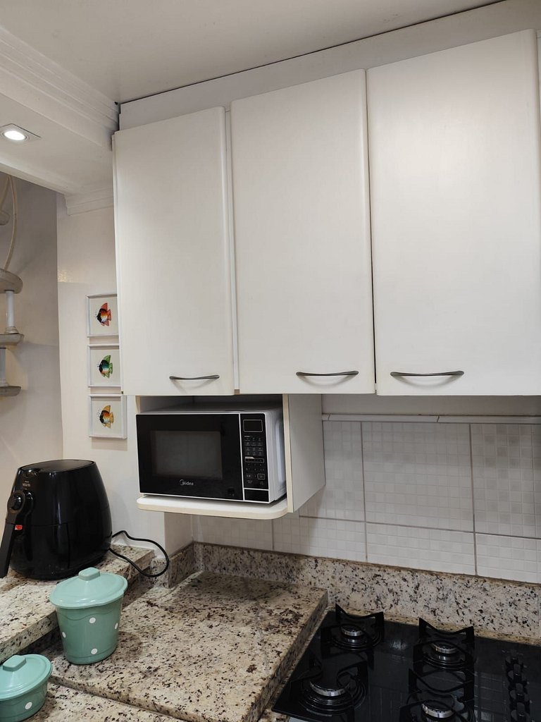 apartamento pé na areia da praia do tombo frente ao mar