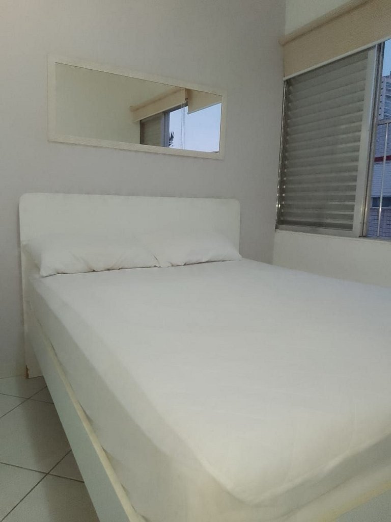 apartamento pé na areia da praia do tombo frente ao mar