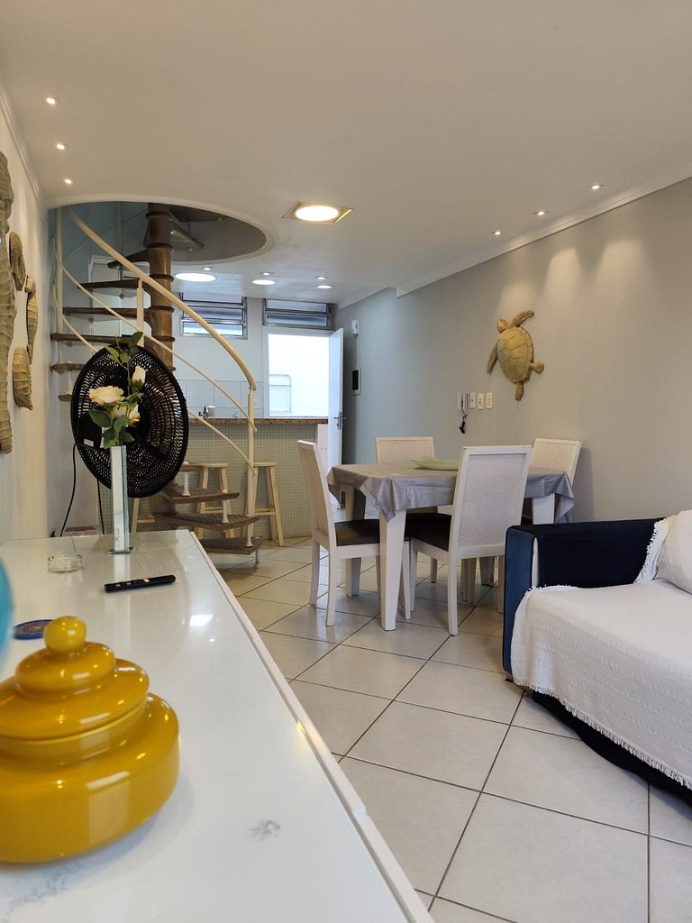 apartamento pé na areia da praia do tombo frente ao mar