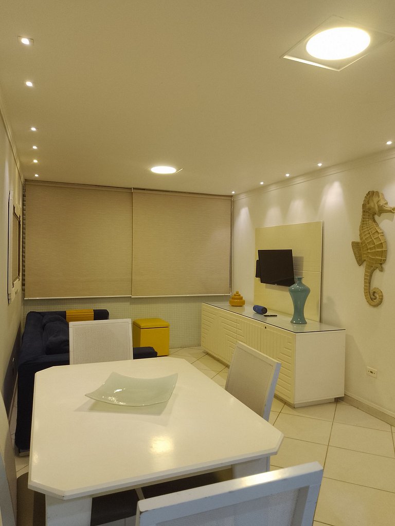 apartamento pé na areia da praia do tombo frente ao mar
