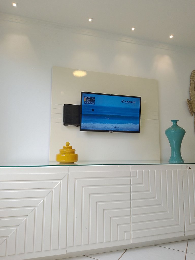 apartamento pé na areia da praia do tombo frente ao mar