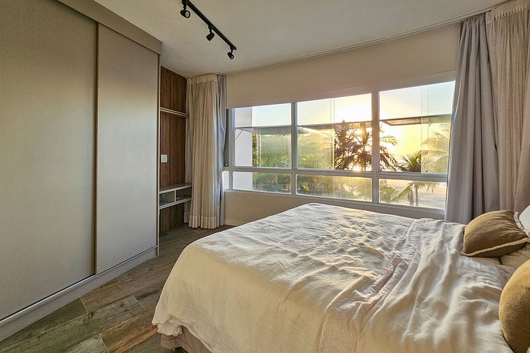 Apartamento pé na areia da praia do Tombo em Frente ao mar