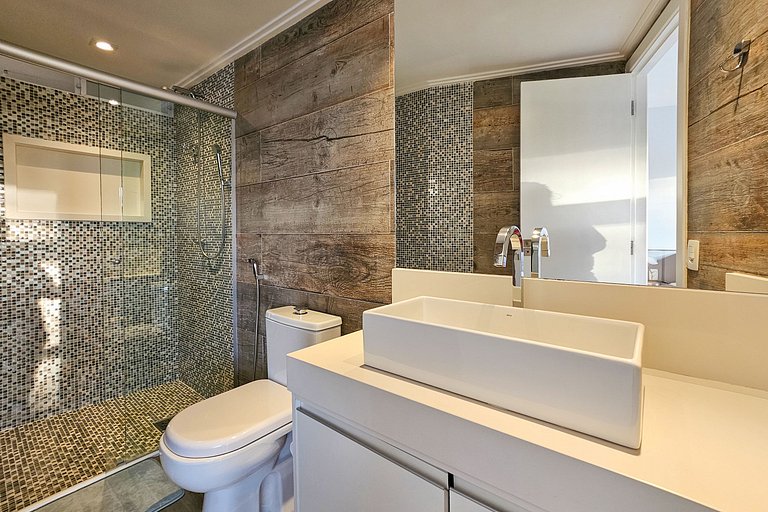 Apartamento pé na areia da praia do Tombo em Frente ao mar