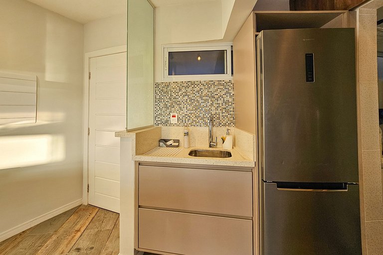 Apartamento pé na areia da praia do Tombo em Frente ao mar