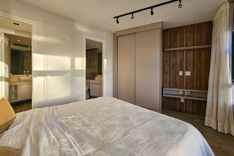 Apartamento pé na areia da praia do Tombo em Frente ao mar