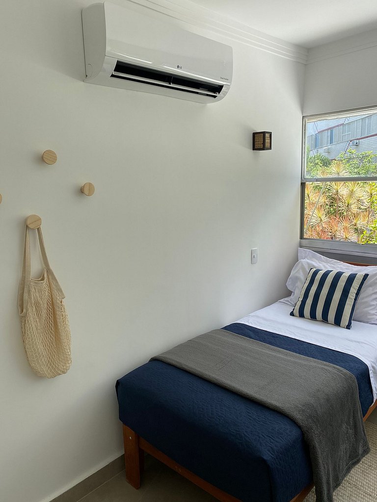 Apartamento pé na areia da praia do Tombo em Frente ao mar