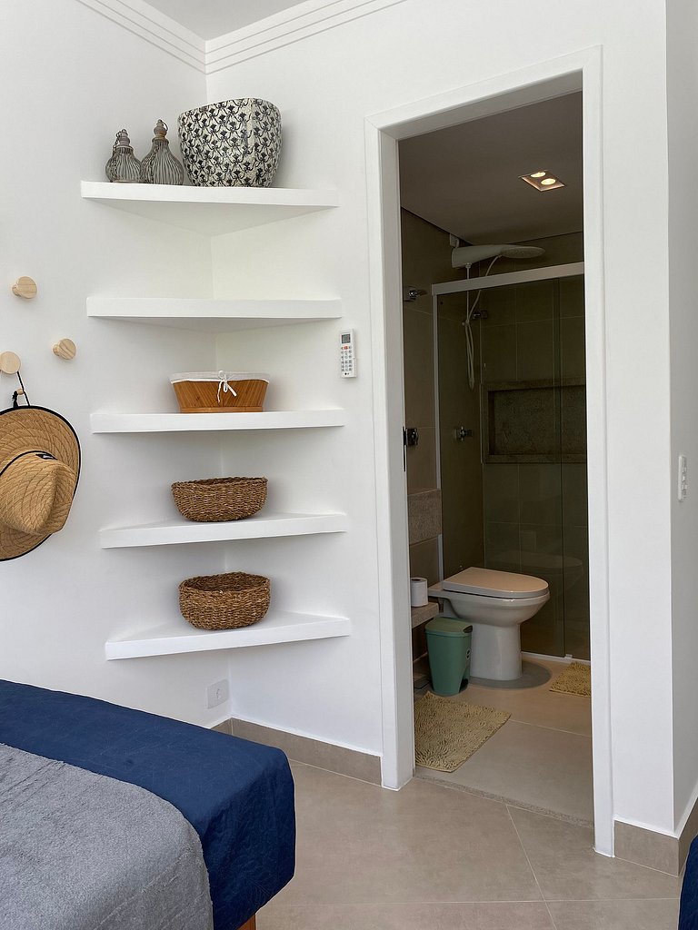 Apartamento pé na areia da praia do Tombo em Frente ao mar