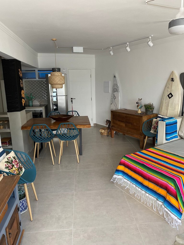 Apartamento pé na areia da praia do Tombo em Frente ao mar