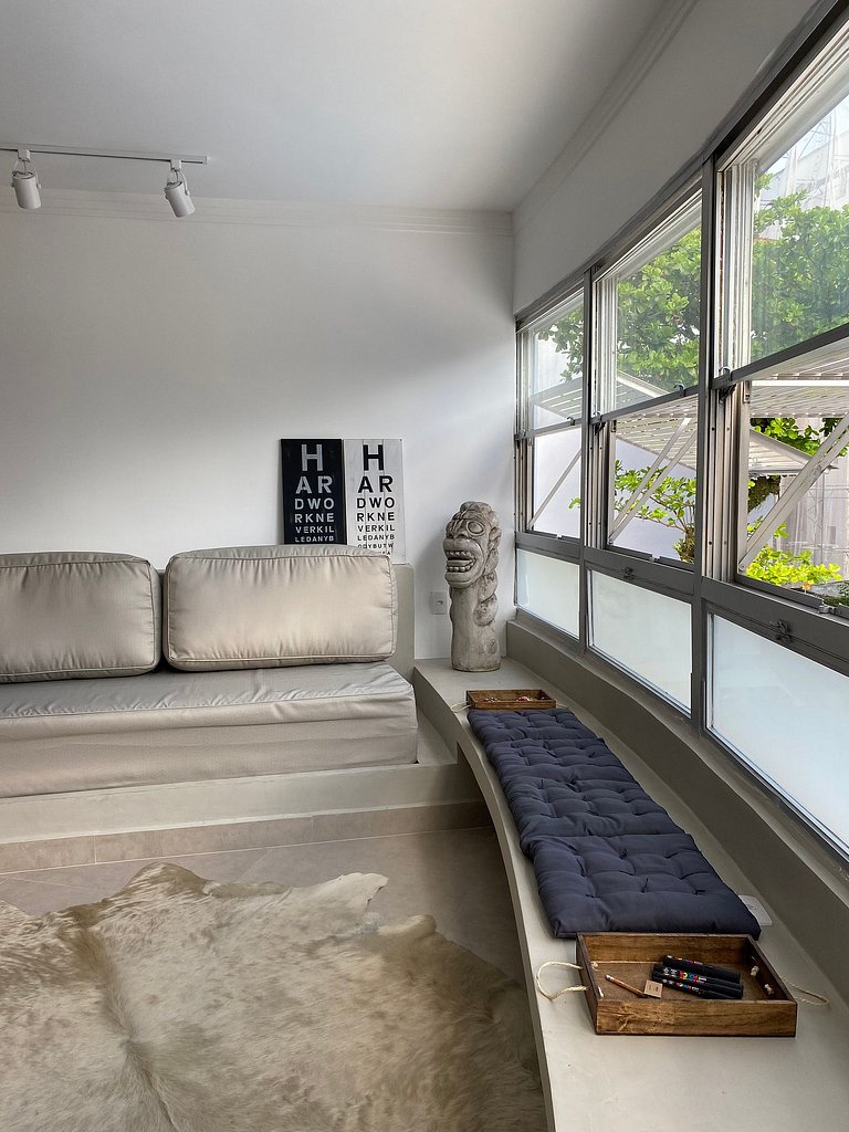 Apartamento pé na areia da praia do Tombo em Frente ao mar