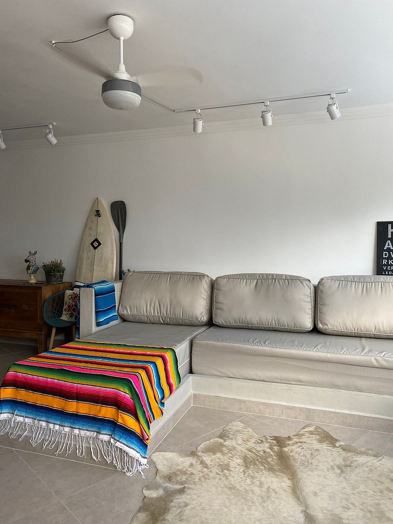 Apartamento pé na areia da praia do Tombo em Frente ao mar