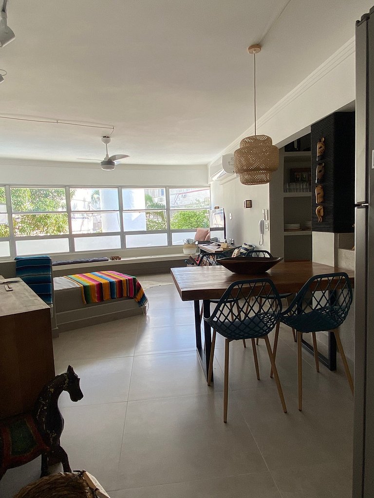 Apartamento pé na areia da praia do Tombo em Frente ao mar
