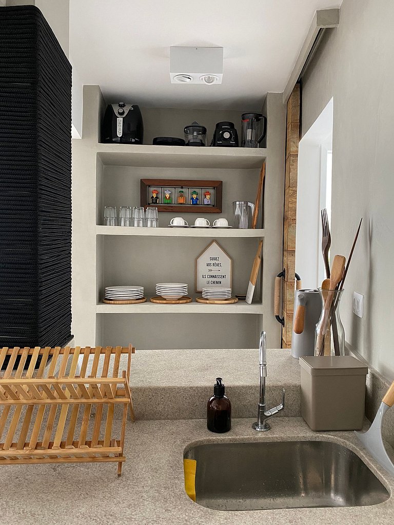 Apartamento pé na areia da praia do Tombo em Frente ao mar