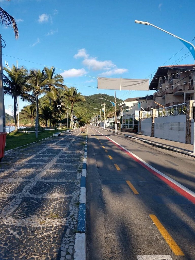 Apartamento pé na areia da praia do Tombo em Frente ao mar