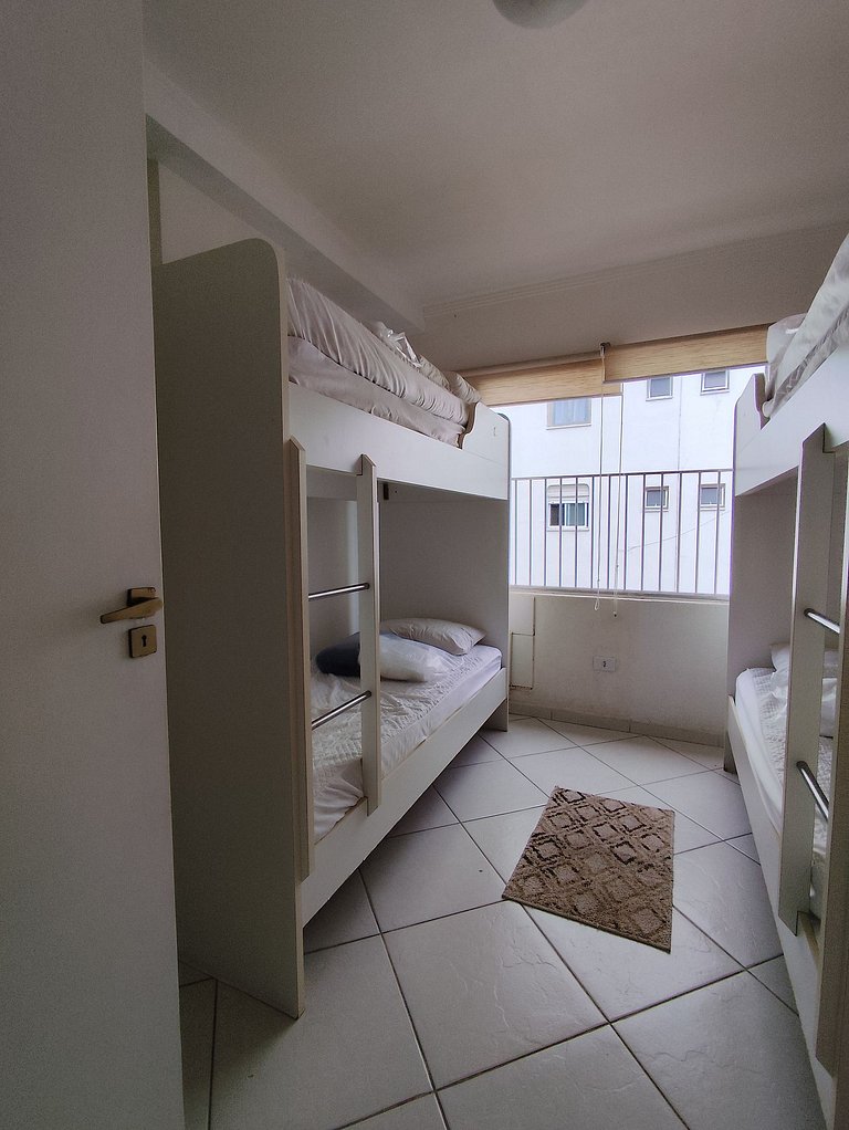 apartamento pé na areia da praia do tombo frente ao mar