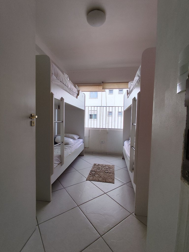 apartamento pé na areia da praia do tombo frente ao mar