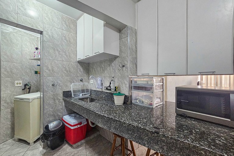 Apartamento pé na areia da praia do Tombo em Frente ao mar