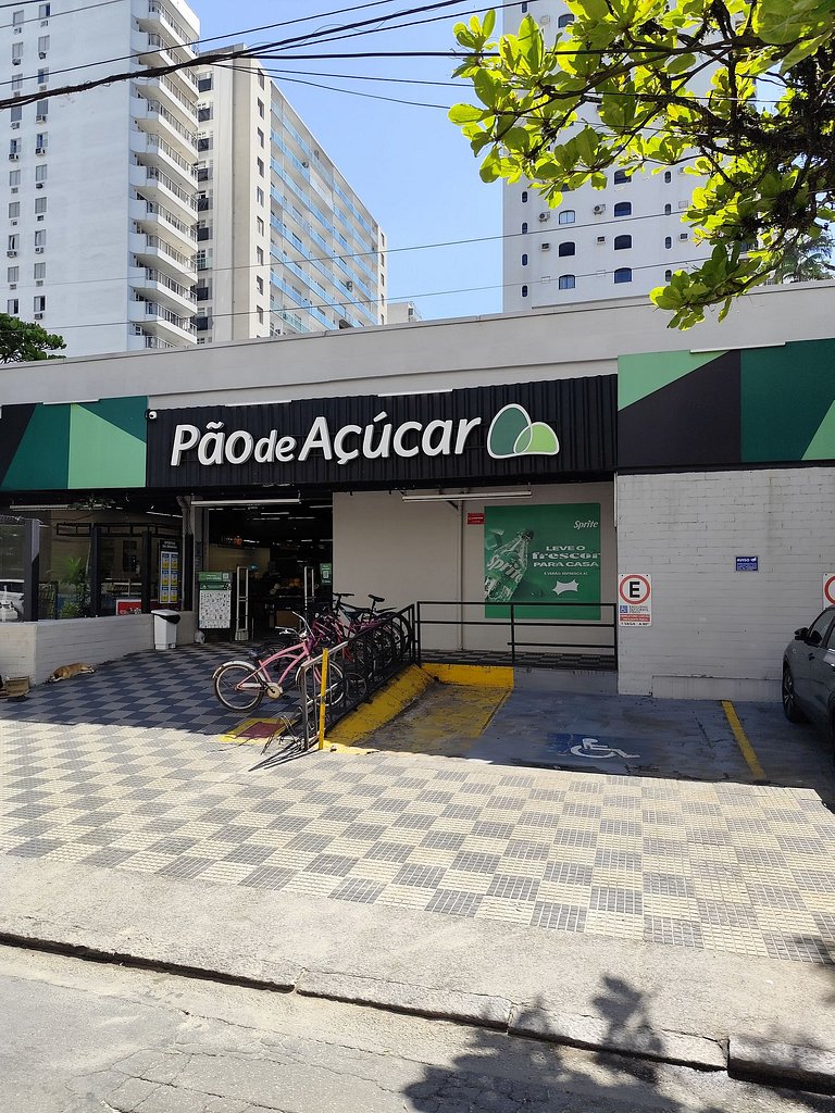 Apartamento pé na areia da praia do Tombo em Frente ao mar