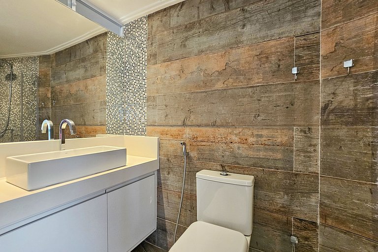 Apartamento pé na areia da praia do Tombo em Frente ao mar