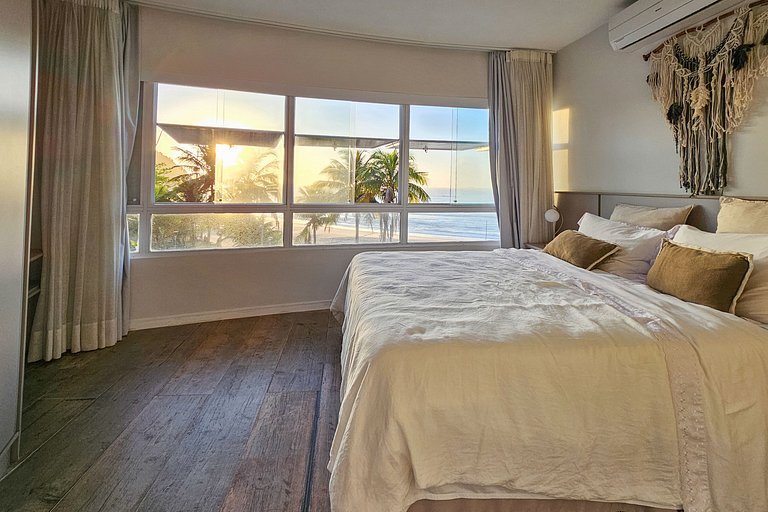 Apartamento pé na areia da praia do Tombo em Frente ao mar