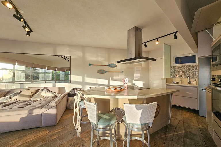 Apartamento pé na areia da praia do Tombo em Frente ao mar