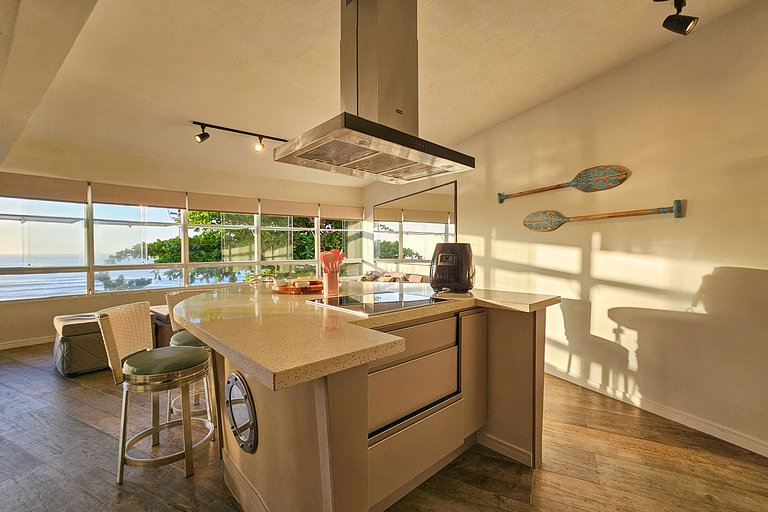 Apartamento pé na areia da praia do Tombo em Frente ao mar