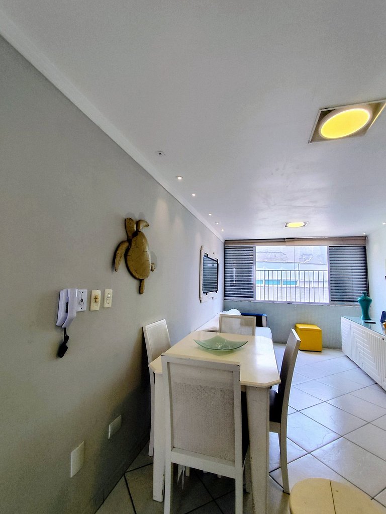 apartamento pé na areia da praia do tombo frente ao mar