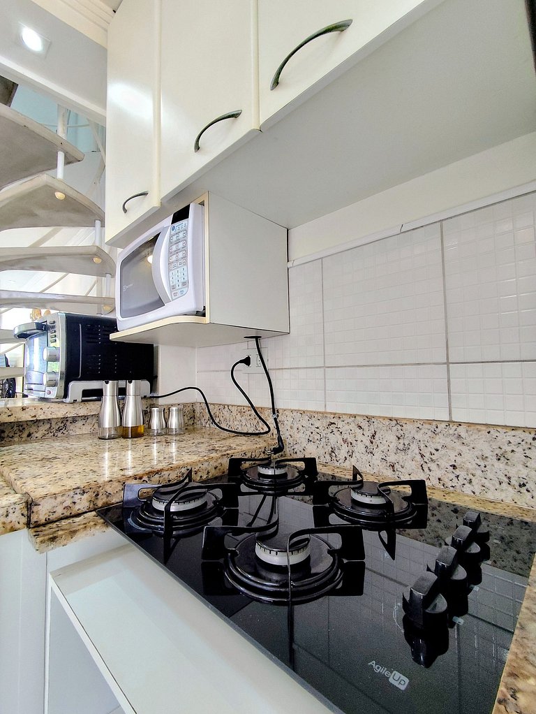 apartamento pé na areia da praia do tombo frente ao mar