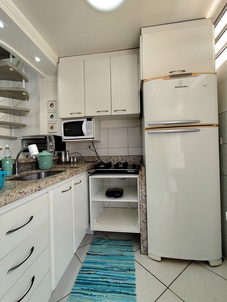 apartamento pé na areia da praia do tombo frente ao mar