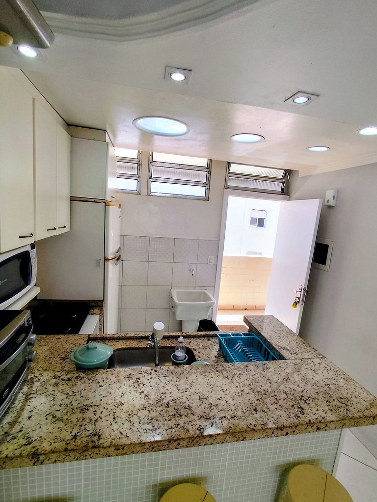 apartamento pé na areia da praia do tombo frente ao mar