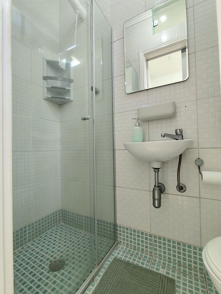 apartamento pé na areia da praia do tombo frente ao mar