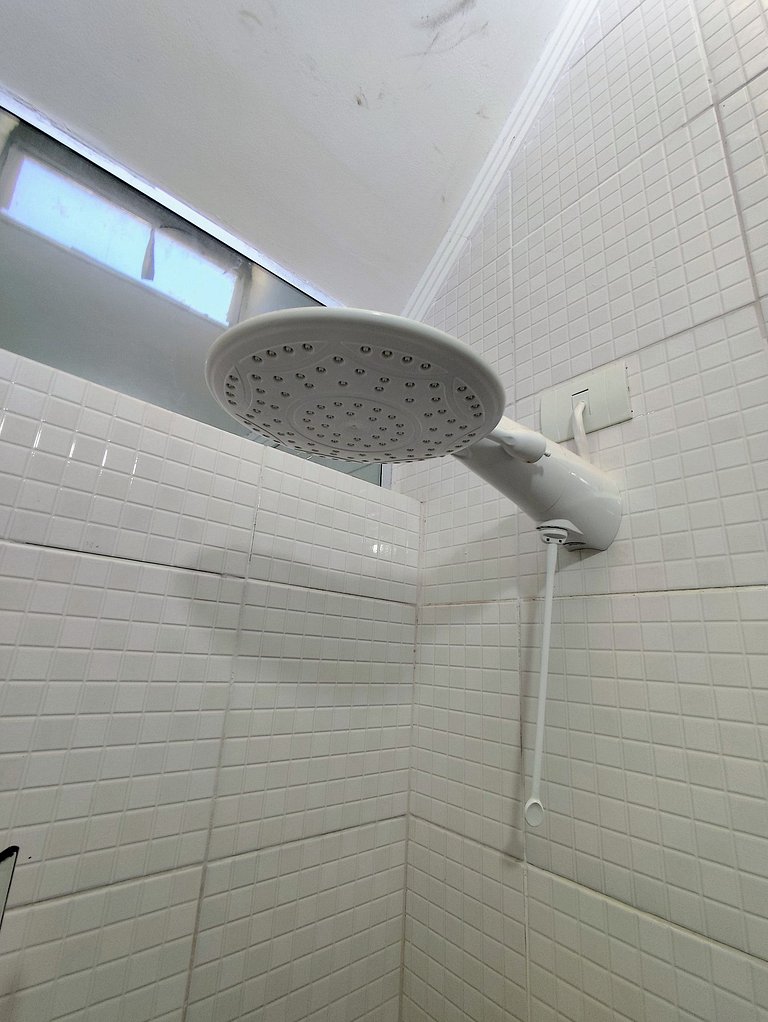 apartamento pé na areia da praia do tombo frente ao mar