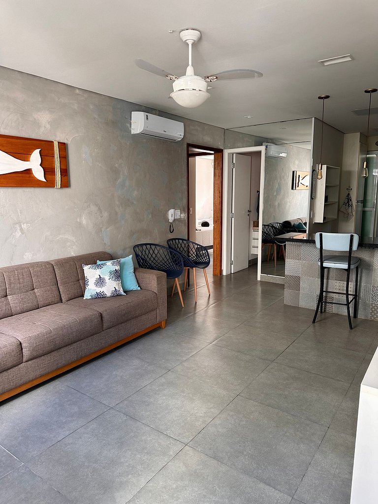 Apartamento pé na areia da praia do Tombo em Frente ao mar