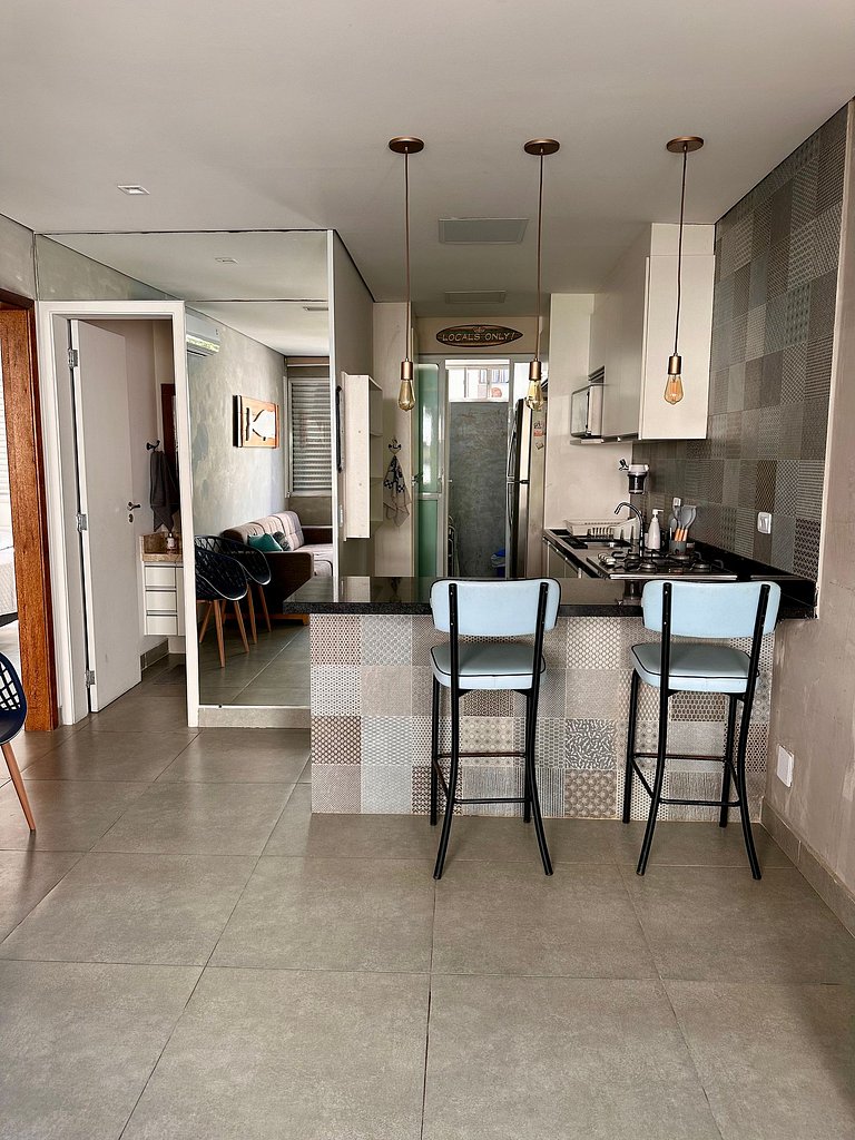 Apartamento pé na areia da praia do Tombo em Frente ao mar