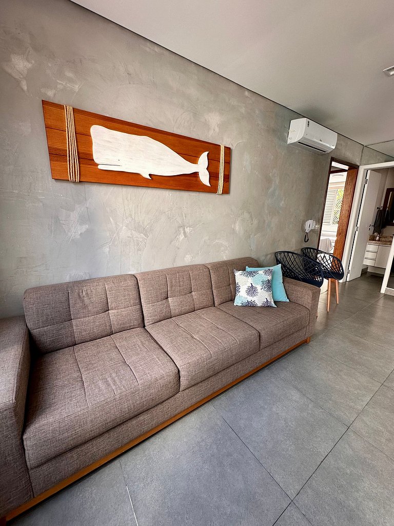 Apartamento pé na areia da praia do Tombo em Frente ao mar