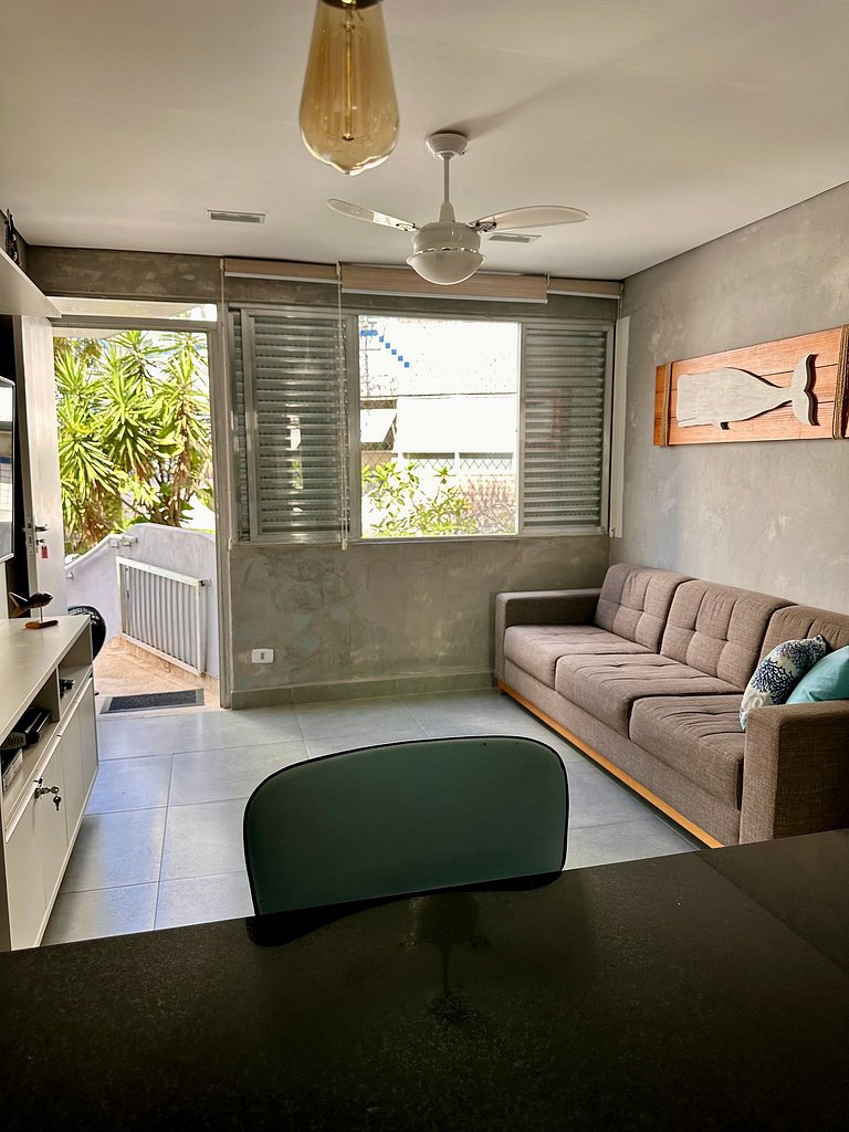 Apartamento pé na areia da praia do Tombo em Frente ao mar