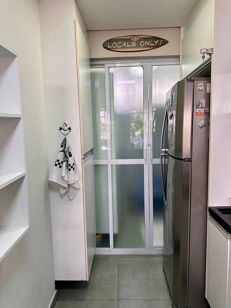 Apartamento pé na areia da praia do Tombo em Frente ao mar