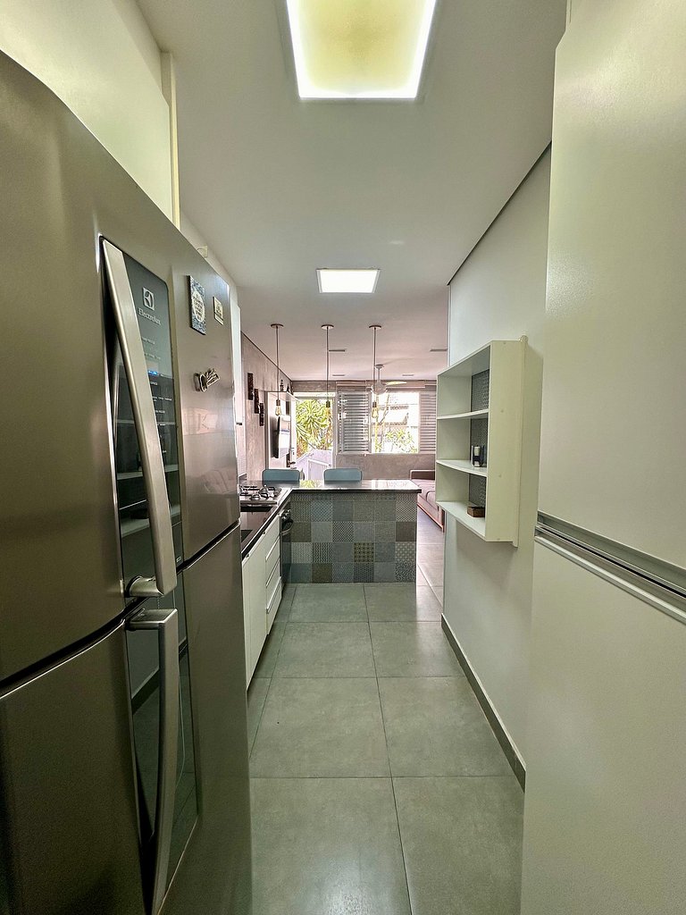 Apartamento pé na areia da praia do Tombo em Frente ao mar