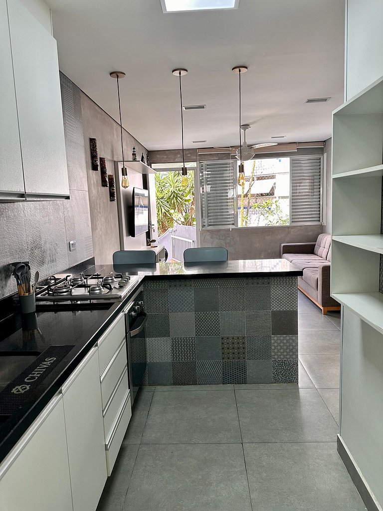 Apartamento pé na areia da praia do Tombo em Frente ao mar