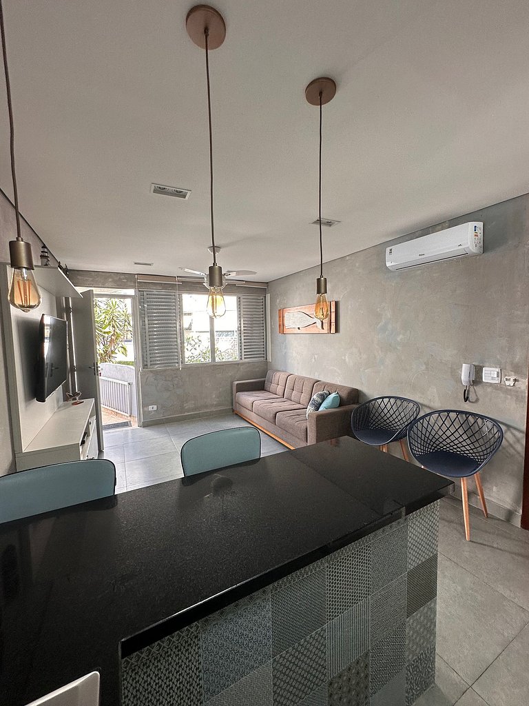 Apartamento pé na areia da praia do Tombo em Frente ao mar