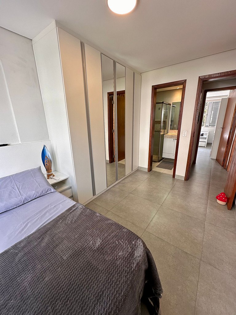 Apartamento pé na areia da praia do Tombo em Frente ao mar