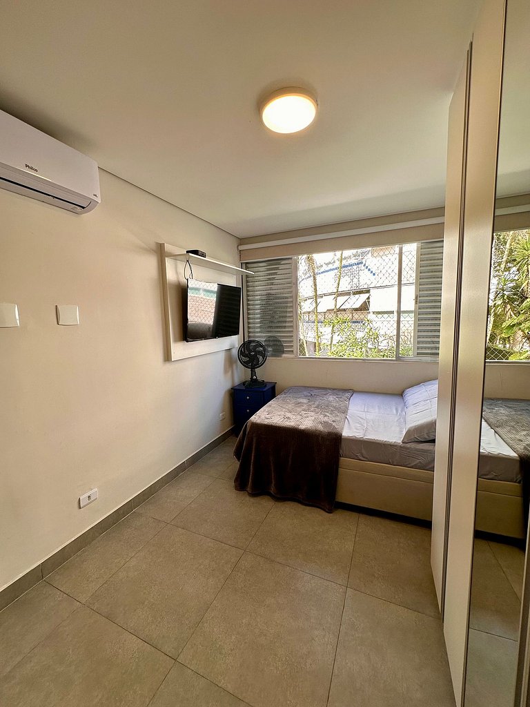 Apartamento pé na areia da praia do Tombo em Frente ao mar