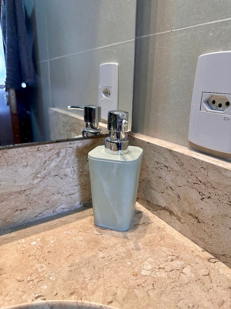 Apartamento pé na areia da praia do Tombo em Frente ao mar