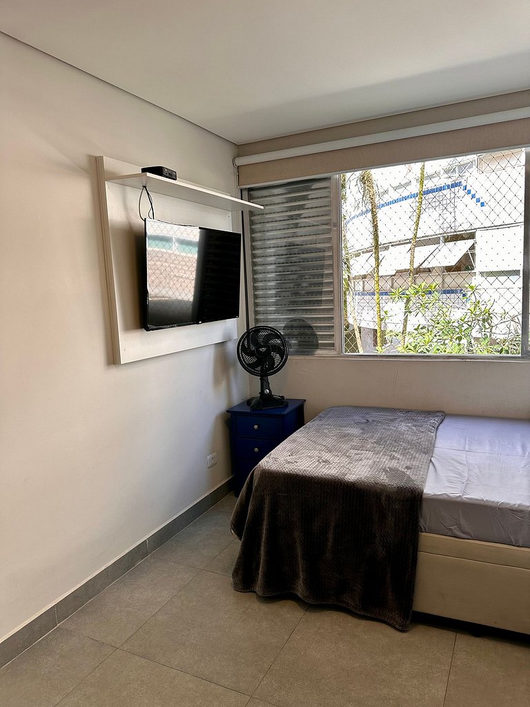 Apartamento pé na areia da praia do Tombo em Frente ao mar