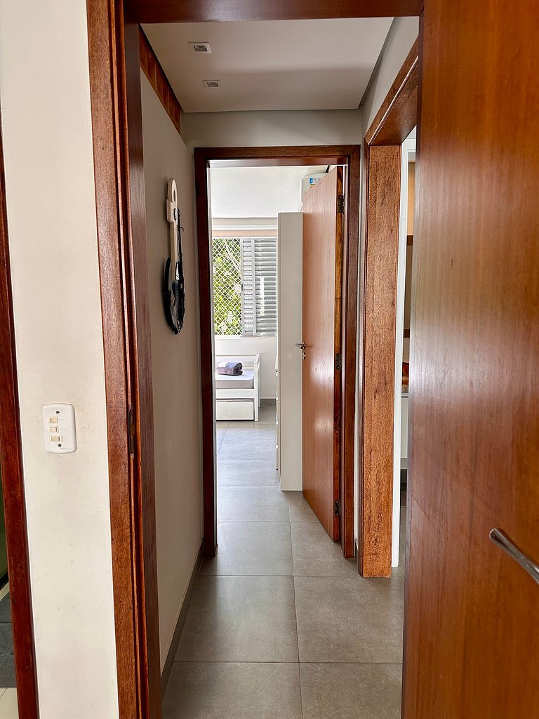 Apartamento pé na areia da praia do Tombo em Frente ao mar