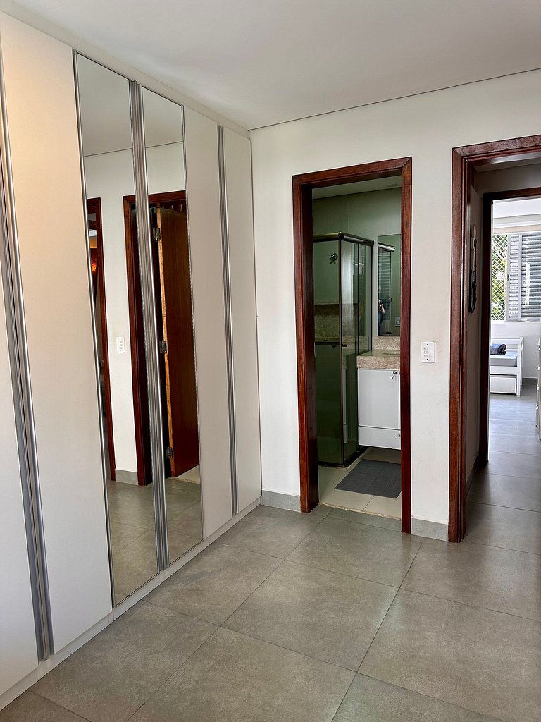 Apartamento pé na areia da praia do Tombo em Frente ao mar