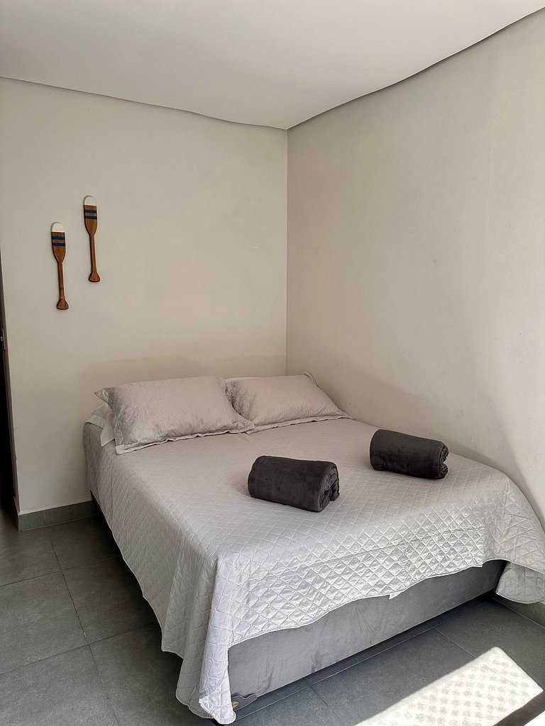 Apartamento pé na areia da praia do Tombo em Frente ao mar